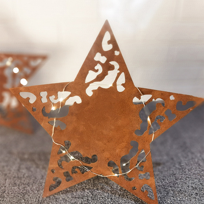 A estrela feito a mão deu forma aos ornamento de aço do jardim de Corten personalizados