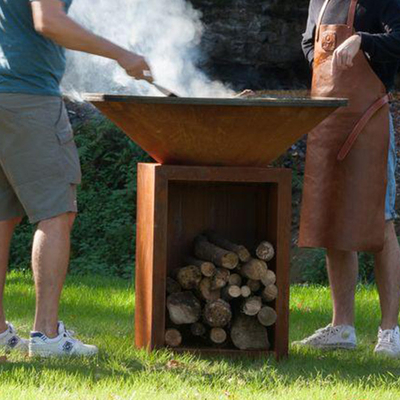 Fogo de aço oxidado Pit Outdoor With Wood Storage da altura 100cm Corten