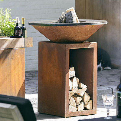 Fogo de aço oxidado Pit Outdoor With Wood Storage da altura 100cm Corten