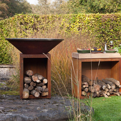 Fogo de aço oxidado Pit Outdoor With Wood Storage da altura 100cm Corten
