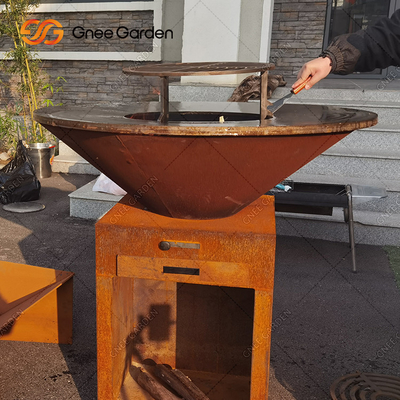 As grades de cozimento exteriores de aço de Corten da oxidação do jardim ateiam fogo a serviços de empacotamento da grade do ASSADO do poço