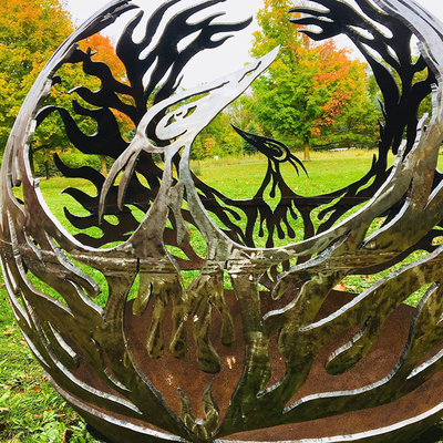Fogueira de aço padrão Phoenix para pátio ao ar livre esfera de corten para aquecimento de jardim